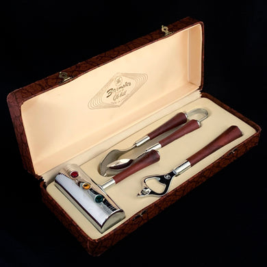 Three-piece set of mid-century vintage Barmates stop light cocktail bar tool accessories. Presented in original satin lined box and the tools look brand new. Set includes red Danger, yellow Caution and green Go handled 3 oz. jigger, ice tongs and opener. Each piece has a gorgeous dark amber bakelite handle and the chrome on each piece is magnificent. Produced by Glo-Hill of Canada, circa 1950. A truly stunning bar tool set! In excellent condition. Box measures 12 3/8 long by 4 3/4 wide by 2 1/4 high.