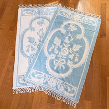 Load image into Gallery viewer, Vintage tone-on-tone blue and white bath towel with floral pattern and tied fringe edge.  In excellent condition, free form tears/stains.  Measures 28 1/2 x 54 inches
