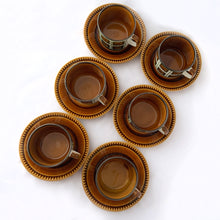 Load image into Gallery viewer, mid-century vintage  Bernadette coffee service. Includes coffee pot, creamer, covered sugar, six cups and saucers on the &quot;Delta&quot; shape. Boch Belgium, 1968.  hand painted in colours of deep green and brown on a white (off white) ground. In excellent used vintage condition. All pieces are free from chips/cracks/repairs with the exception of a minor chip to the sugar bowl lid and one saucer as shown in the photos.
