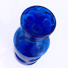 Load image into Gallery viewer, Fantastic cobalt blue liquor decanter with bubble design and stopper. Made in Taiwan, circa 1970.  In good vintage condition, no chips or cracks, small manufacturer&#39;s defect on the decanter&#39;s side from a burst air bubble.  Measures 8&quot;
