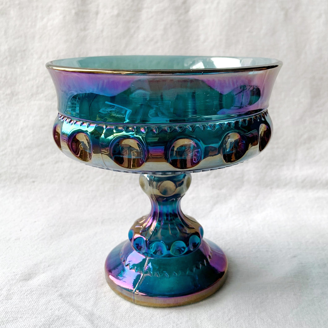 This vintage round pedestal compote in the 