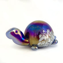 Load image into Gallery viewer, Vintage hand blown iridescent blue carnival glass turtle paperweight with infused white spots on the body.  In good vintage condition with a scuff mark show in pic 2. Unsigned.  Measures 4&quot; x 2-1/4&quot; x 1-7/8&quot;
