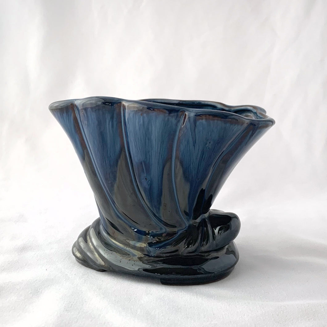 This adorable cornucopia horn planter has a beautifully sculpted shape with a scalloped edge. The cobalt blue drip glaze is gorgeous and will be the perfect addition to your vintage or modern home decor!  In excellent condition. No chips or cracks. Unmarked.  Size: 6-1/2