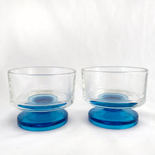 Load image into Gallery viewer, A recent treasure hunt uncovered this stunning set of two (2) mid-century Italian-made footed sherbet glasses (circa 1950-60). The blue is reminiscent of the Mediterranean Sea with its azure coloured water. Imagine eating a scrumptious gelato from these lovelies at a seaside café. They are simply stunning!  All are in excellent vintage condition, no chips or cracks.  Measures 3-3/8&quot; x 2-3/4&quot;
