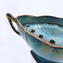 Load image into Gallery viewer, Stunning vintage mid-century iridescent blue lustre ware, gondola shaped, twohandled flower frog vase with gold details. The twelve hole frog fits nicely inside the bowl and is easily removed using its built in handle. Produced by Royal Winton Grimwades, in the potteries district of Stoke-on-Trent, England, circa 1950s. The beauty is ready for a gorgeous flower arrangement! In excellent condition, free from chips, cracks or wear. Bowl measures 13-1/2&quot; x 6&quot; x 6-1/2&quot;, frog measures 9-3/8&quot; x 5-3/8&quot;
