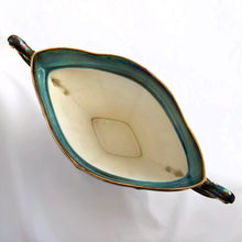 Load image into Gallery viewer, Stunning vintage mid-century iridescent blue lustre ware, gondola shaped, twohandled flower frog vase with gold details. The twelve hole frog fits nicely inside the bowl and is easily removed using its built in handle. Produced by Royal Winton Grimwades, in the potteries district of Stoke-on-Trent, England, circa 1950s. The beauty is ready for a gorgeous flower arrangement! In excellent condition, free from chips, cracks or wear. Bowl measures 13-1/2&quot; x 6&quot; x 6-1/2&quot;, frog measures 9-3/8&quot; x 5-3/8&quot;
