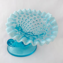 Load image into Gallery viewer, This gorgeous vintage blue hobnail cornucopia candle holder or vase has a lovely crimped opalescent edge. Produced by the Fenton Glass Co. in Williamstown, West Virginia, USA between 1940 - 1954 and 1959 - 1965.  It is perfect as a candle holder or flower vase or could even be used for make-up brushes on a vanity. The glass is a gorgeous light blue with milky opalescent rims that will brighten any room.   Unmarked and in excellent condition, no chips and no cracks.  Measures 5-1/4&quot; x 5&quot; x 5-1/2&quot; 
