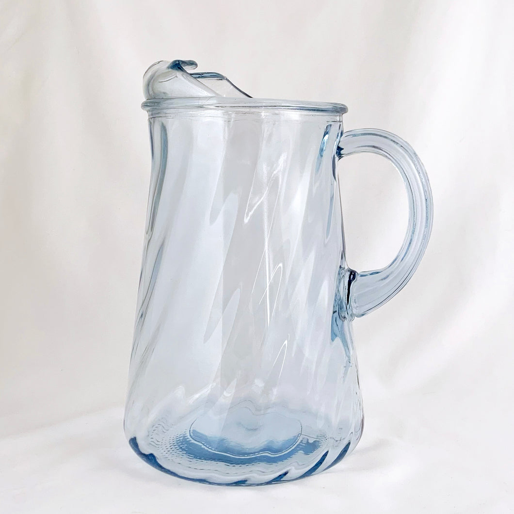 We are digging the blue optic swirl of this vintage glass ice lip pitcher. Produced by the Bartlett Collins Glass Company, circa 1970. Perfect for serving water, lemonade, iced tea or your favourite cocktails.  In excellent condition, no chips or cracks.   Measures  5 3/4 x 9 1/4 inches