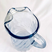 Load image into Gallery viewer, We are digging the blue optic swirl of this vintage glass ice lip pitcher. Produced by the Bartlett Collins Glass Company, circa 1970. Perfect for serving water, lemonade, iced tea or your favourite cocktails.  In excellent condition, no chips or cracks.   Measures  5 3/4 x 9 1/4 inches
