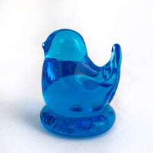 Load image into Gallery viewer, This lovely hand blown art glass bluebird was created by artisan Leo Ward in 1996. Mr. Ward was the creator of Arkansas&#39; Bluebird of Happiness and owner of Terra Studios in Arkansas. He passed away at 89 years young in 2017. This piece is in excellent condition, free from chips or cracks.  Measures 1-3/4&quot; x 2-1/4&quot;
