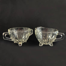 Load image into Gallery viewer, Elevate your tablescape with the fun and effervescent art deco design of this &quot;Burple-Inspiration&quot; creamer and sugar in clear pressed glass featuring curved columns accented with bubbles in graduating sizes. Crafted by Anchor Hocking, USA, circa 1930s.   In excellent vintage condition, no chips or cracks.  Measures 3 inches
