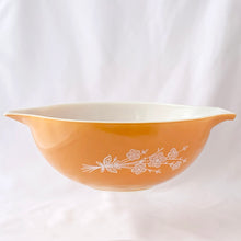 Load image into Gallery viewer, Vintage &quot;Butterfly Gold 2&quot; Cinderella mixing bowl set. This pattern has an asymmetrical flower and butterfly pattern in white on golden-orange or golden yellow. Designed by Gregory Mirow and produced by Pyrex between 1979-1981.  All are in excellent condition, shiny, free from chips/cracks.  442, 1-1/2 quart, measures 9-1/4&quot; x 3-1/2&quot; (golden orange bowl)  443, 2-1/2 quart, measures 10-3/4&quot; x 3-7/8&quot; (golden yellow bowl)  444, 4 quart, measures 13&quot; x 4-3/8&quot; (golden orange bowl)
