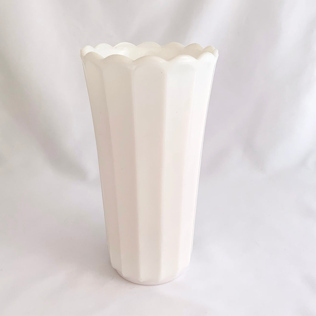 This classic vintage milk glass grecian-style large vase has a ultra feminine fluted shaped which would be perfect for a beautiful floral display.  Made by the Continental Can Company, USA, circa 1960s. It's simple and elegant shape suits any decor style. Makes a great centrepiece for a wedding or special occasion floral arrangement.  In excellent condition, no chips or cracks.  Measures 4 1/2 x 8 1/2 inches