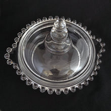 Load image into Gallery viewer, Beautiful vintage round Imperial Candlewick covered butter dish with tab-handles (shape 400/144) cut in WJ Hughes 12-petalled &quot;Corn Flower&quot; pattern. Glass blank produced by the Imperial Glass Company, USA, circa 1950s.  In excellent condition, no chips, cracks, minimal wear.  Measures 5 1/2 inches
