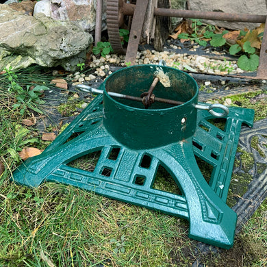 Get ready to put up the Christmas tree using this gorgeous cast iron stand in hunter green, decorated with Christmas trees! The perfect addition to your vintage or modern Christmas decor. Made by the John Wright Company  In good vintage condition.  Measures 12
