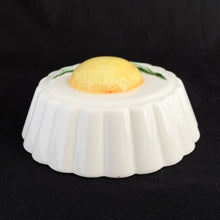 Load image into Gallery viewer, Vintage ceramic kitchen hanging round mould with an orange, circa 1970. Made by Crowning Touch, Japan.  In excellent condition, no chips or cracks.  Measures 5-1/2&quot;
