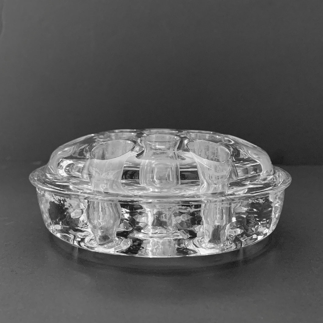 Vintage clear glass flower frog with narrow rim and 13 holes.  In excellent condition, free from chips.  Measures 4 1/2 x 1 1/2 inches