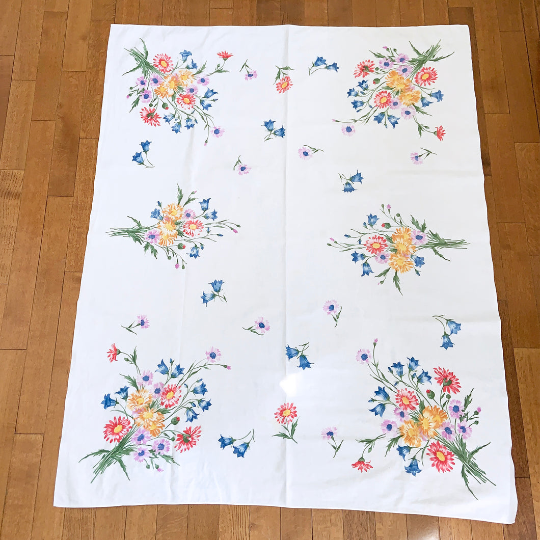 Lovely vintage linen tablecloth with a colourful flower bouquets in shades of pink, yellow, blue, purple and green.  In good vintage condition, free from tears, minor stains.  Measures 49