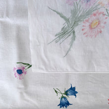 Load image into Gallery viewer, Lovely vintage linen tablecloth with a colourful flower bouquets in shades of pink, yellow, blue, purple and green.  In good vintage condition, free from tears, minor stains.  Measures 49&quot; x 61&quot;
