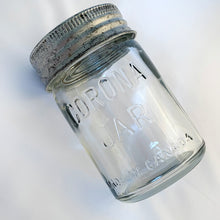 Load image into Gallery viewer, Vintage 1 pint clear glass Corona Mason Jar with lid and zinc ring closure.  All are in good vintage condition.  Measures 3 x 6 1/2 inches  Capacity 1 pint
