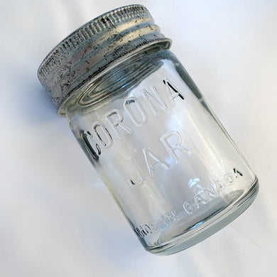 Vintage 1 pint clear glass Corona Mason Jar with lid and zinc ring closure.  All are in good vintage condition.  Measures 3 x 6 1/2 inches  Capacity 1 pint