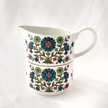 Load image into Gallery viewer, Let your kitchen come alive with this gorgeous Vintage &quot;Country Garden&quot; Midwinter Creamer and Sugar Set! Its retro design with teal, blue, purple, pink and green on a white background is sure to bring a cheerful energy. Crafted by Midwinter Ltd. in Staffordshire England between 1968-1978, this set is in excellent condition, free from chips/cracks and ready to use. Enjoy!
