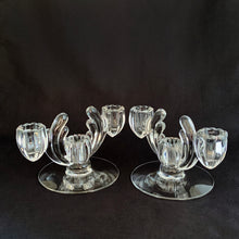 Load image into Gallery viewer, We have a striking pair of vintage art deco style 3-lite candlesticks made by the Heisy Glass Company in their &quot;Cristolite&quot; pattern. They have a wonderful sparkling quality. Circa 1937–1957  In excellent condition, no chips or cracks.  Measures 7 x 4 1/2 x 4 1/4 inches
