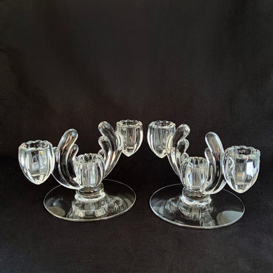 Striking pair of vintage art deco Cristolite 3-lite candle holders. Crafted by Heisy Glass, 1937–1957. A truly unique set!

In excellent condition, no chips.

Measures 7 x 4 1/2 x 4 1/4 inches