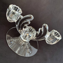Load image into Gallery viewer, We have a striking pair of vintage art deco style 3-lite candlesticks made by the Heisy Glass Company in their &quot;Cristolite&quot; pattern. They have a wonderful sparkling quality. Circa 1937–1957  In excellent condition, no chips or cracks.  Measures 7 x 4 1/2 x 4 1/4 inches
