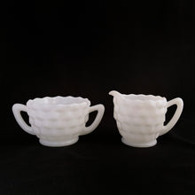 Load image into Gallery viewer, Classic milk glass creamer and sugar in the &quot;Cube&quot; pattern. A lovely addition to your tea/coffee tableware. Produced by the Jeannette Glass Co. USA., circa 1970.  In excellent condition, free from chips or cracks.  Creamer measures 2-7/8&quot; x 2-5/8&quot; and sugar measures 3-3/8&quot; x 2-3/8&quot;
