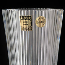 Load image into Gallery viewer, vintage modernist style twenty-four percent lead crystal vase cut in vertical ridges with a band of varying sized circles. The cut circles create an interesting kaleidoscope-like effect. A brilliant piece of art glass designed and executed by artist Josef Pravec, produced for Crystal BOHEMIA in Podebrady, Czechoslovakia, circa 1974. In excellent condition, free from chips, cracks or damage. Signed by the artist on the bottom. Measures 4-5/8&quot; x 13&quot;
