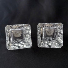 Load image into Gallery viewer, A vintage set of two traditional cut crystal pyramid shaped salt and pepper shakers in the art deco style with sterling silver and mother of pearl lids.   In excellent condition, no chips or cracks. Marked BIRKS STERLING on the lid.  Measures 1-1/4&quot; x 1-3/4&quot;
