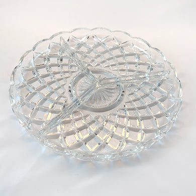 This diamond or Dahlia flower pattern of this glass divided relish dish reflects the light with such brilliance, you're going to need sunglasses! Circa 1950.  In excellent condition, no chips or cracks.  Measures 8 3/4 x 1 inches
