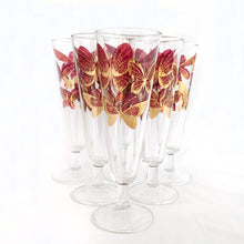 Load image into Gallery viewer, Sip a cold beer or bubbly champagne in style with these stunning vintage pilsner glasses decorated with bright gold and deep pink butterflies. Maker unknown. Circa 1960s.  In excellent condition, free from chips/cracks/wear.  Measures 8.5&quot; tall
