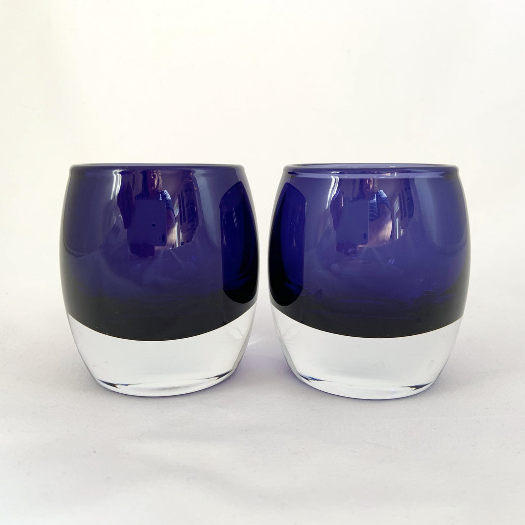 Add some ambiance to spa time or a special occasion with this pair of striking hand blown glass votive candle holders with clear bottoms and an cobalt blue body. They are gorgeous!  In excellent vintage condition, free from chips.  Measures 3 x 3 1/4 inches