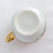 Load image into Gallery viewer, Pretty vintage white porcelain demitasse cup and saucer beautifully hand painted with pink and purple aster flowers with gold gilt on the rims and handle. Unmarked.  In excellent condition, free from chips/cracks/repairs.  Dimensions of cup 2&quot; x 2&quot; and saucer 4-3/8&quot;
