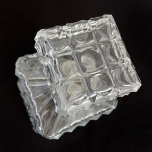 Load image into Gallery viewer, Vintage clear pressed glass liquor decanter with a diamond and dot pattern with square dot pattern stopper. Stopper has a plastic insert for a tight seal. A fabulous addition to your bar cart! This would even be a great decanter for fruit juices for your brunch buffet.  Excellent condition, no chips or cracks.  Measures 3 3/8 x 8 7/8 inches
