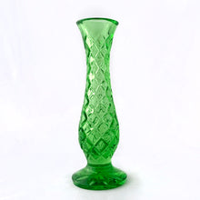Load image into Gallery viewer, Pretty vintage green pressed glass footed bud vase with diamond pattern and star on the bottom. Maker unknown.  In excellent condition, free from chips/cracks.  Measures 2 1/4 x 6 1/2 inches
