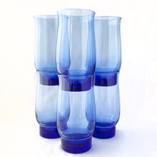 Load image into Gallery viewer, Vintage set of six dusky blue &quot;Tulip&quot; iced tea glasses. Produced by the Libbey Glass Company, circa 1974. And their stackable!  In excellent condition, free from chips/cracks.  Measures 3&quot; x 6&quot;, holds 16oz
