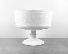 Load image into Gallery viewer, A beautiful vintage milk glass footed compote. Produced by the E.O. Brody Glass Co., USA, circa 1960. Perfect to use a fruit bowl, catchall or planter.  In excellent condition, free from chips/cracks.   Measures 6 3/4 x 5 1/2 inches
