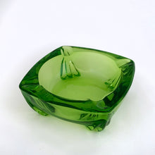 Load image into Gallery viewer, Vintage mid-century art deco style emerald green pressed glass square patio ashtray with stylized foot. Produced by Duncan Miller.  In excellent condition, free from chips/cracks.  Measures approximately 3-1/2&quot; x 1-1/4&quot;
