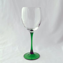 Load image into Gallery viewer, Set of six elegant vintage mod Luminarc &quot;Emerald&quot; water goblets featuring green stem, foot and clear blown glass bowl. Crafted by Cristal d&#39;Arques, France, between 1996 - 2008. We are loving the vibrancy of the stems that will add the perfect pop of colour to any tablescape. Cheers!  In excellent condition free from chips/cracks. Unmarked.  Each glass measures 3 x 8-1/8 inches   
