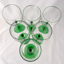 Load image into Gallery viewer, Elegant vintage mod Luminarc emerald green stem/foot with clear blown glass bowl water goblets, set of six. Produced in France by Cristal d&#39;Arques between 1996 - 2008. We are loving the vibrancy of the stems that will add the perfect pop of colour to any tablescape. Cheers!  In excellent condition free from chips/cracks. Unmarked.  Each glass measures 3&quot; x 8-1/8&quot;
