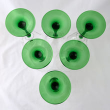 Load image into Gallery viewer, Elegant vintage mod Luminarc emerald green stem/foot with clear blown glass bowl water goblets, set of six. Produced in France by Cristal d&#39;Arques between 1996 - 2008. We are loving the vibrancy of the stems that will add the perfect pop of colour to any tablescape. Cheers!  In excellent condition free from chips/cracks. Unmarked.  Each glass measures 3&quot; x 8-1/8&quot;
