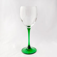 Load image into Gallery viewer, Elegant vintage mod Luminarc emerald green stem/foot with clear blown glass bowl wine goblets, set of six. Produced in France by Cristal d&#39;Arques between 1996 - 2008. We are loving the vibrancy of the stems that will add the perfect pop of colour to any tablescape. Cheers!  In excellent condition free from chips/cracks. Unmarked.  Each glass measures 2 3/4 x 7 5/8 inches
