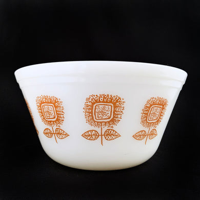Classic vintage white milk glass mixing bowl decorated with gold sunflower pattern. Produced by Federal Glass, circa 1960. Perfect for mixing, serving and storing your culinary creations!  In good vintage condition, no chips or cracks, minor wear to the interior and the printing is intact yet not fully vibrant.  Measures 8 x 4 inches