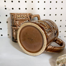 Load image into Gallery viewer, Pair Vintage Embossed Mugs Japan Japanese pottery ceramic glazed kitschy kitsch home decor coffee tea hot chocolate beverage cups handled brown fireplace mantel caldron fire brick pattern housewares flea market style Freelton Hamilton Antique Mall Community Store Shop Toronto Canada
