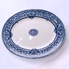 Load image into Gallery viewer, Classic flo blue and white ironstone platter. A gorgeous piece of transferware produced by Doulton in Burslem England, circa 1930s. This large serving platter will be the star of family meal, displays well in a china cabinet or could be used as wall art.  In good vintage condition, minor chip to the edge, but it may be a manufacturer&#39;s defect. Flat bottom has normal wear. Marked.  Measures 15 3/8 x 12 1/2 inches
