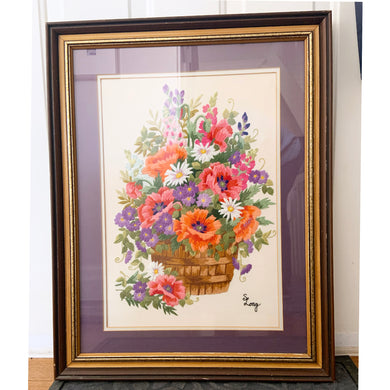 This is a stunning hand embroidered crewel of a colourful bouquet of flowers in a basket. A large piece which would have taken many hours to stitch and the craftsperson did an excellent job on this very detailed embroidery. One of the most beautiful pieces we've found in the wild! Professionally stretched, matted and framed in wood (with glass).  In excellent condition.  Embroidered area measures approximately 13