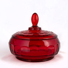 Load image into Gallery viewer, Vintage &quot;Georgian Ruby&quot; lidded pressed glass candy dish. This piece has a honeycomb detail and the lid is topped off with an egg-shaped final. Produced by Viking Glass between 1940 - 1998. Use as intended, or for bath salts/bombs as part of your bath decor. The deep ruby red colour is striking and the foot glows under black light!  In excellent condition, no chips or cracks.  Bowl measures 5-1/8&quot; x 5&quot;
